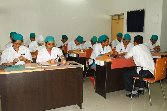 Faculty conducting clinical demonstration for undergraduate students