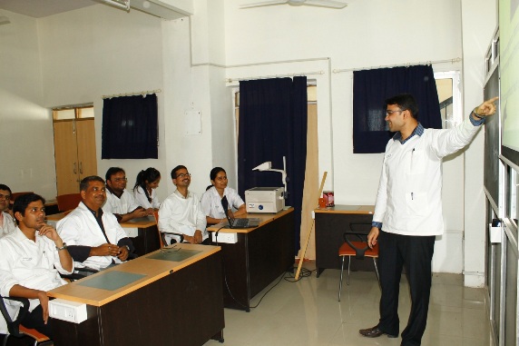 Seminar being conducted postgraduate student