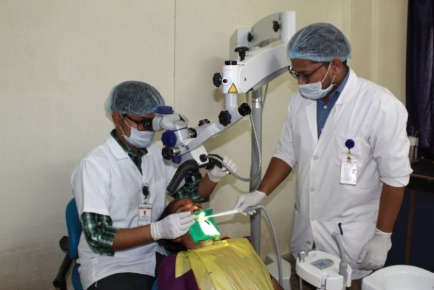 Endodontic Treatment using dental operating microscope